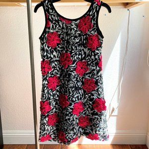 Vibrant black and white dress with pink flowers